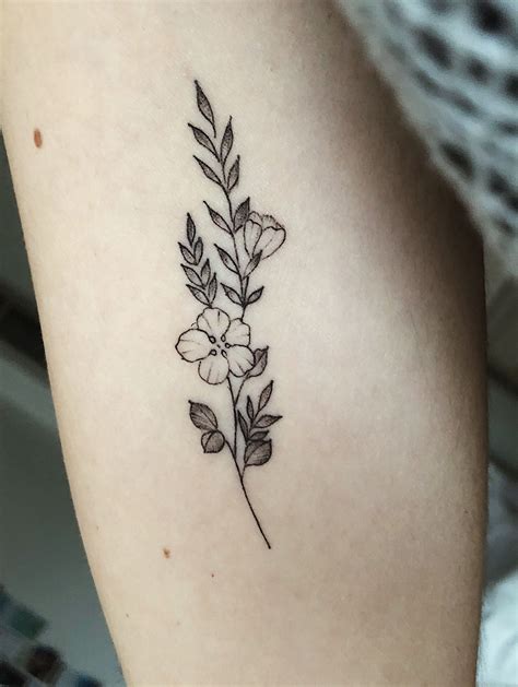 flower tattoo side|aesthetic flower tattoos.